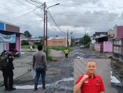 Reza Rumambi Kawal Perbaikan Jalan di Griya Paniki Indah Manado