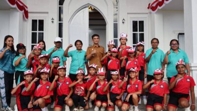 Talaud Semarak, Bupati Welly Buka Lomba Gerak Jalan Peringatan HUT ke-80 RI