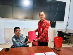 Serah Terima Jabatan Kadis Kominfo Minut, Aldrin Posumah Resmi Gantikan Robby Parengkuan